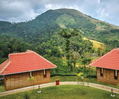 https://imgcld.yatra.com/ytimages/image/upload/t_hotel_yatra_city_desktop/v1447796262/Domestic Hotels/Hotels_Nilgiri/Wild Planet/Overview.jpg